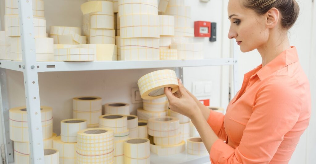 A woman reading labels.