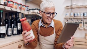 Business lady with labeled product
