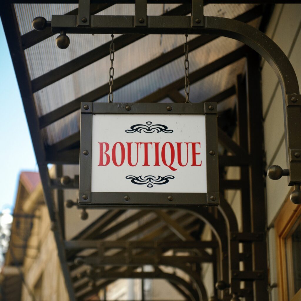 boutique sign above shop