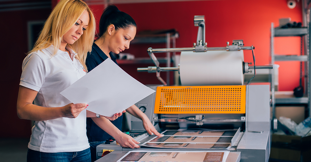 Image of woman checking prints