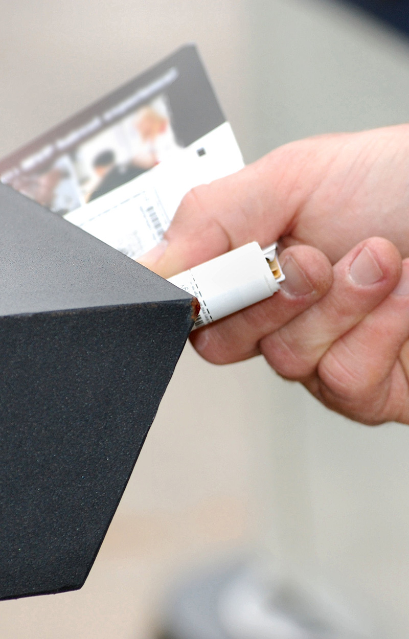 placing advertisement in mailbox