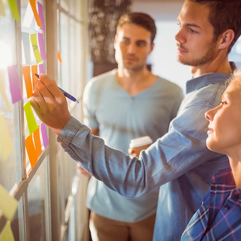 design meeting, sticky notes on wall