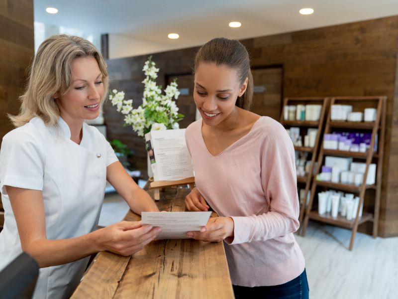 Client looking at sales sheet.