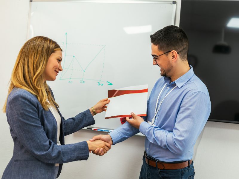 giving a certificate to a student