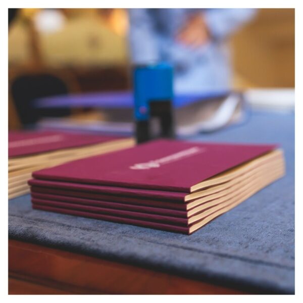 printer brochures on table