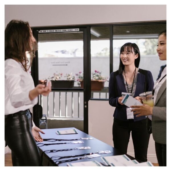 business people speaking at conference table