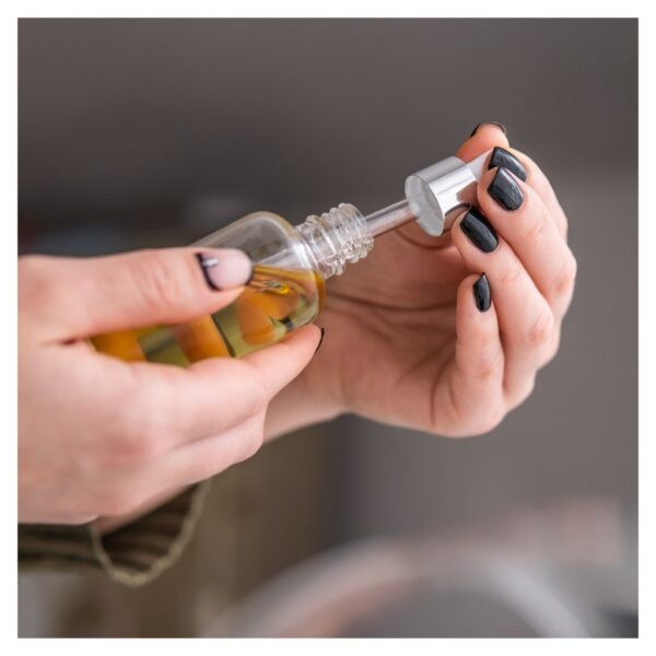 customer holding personal beauty product