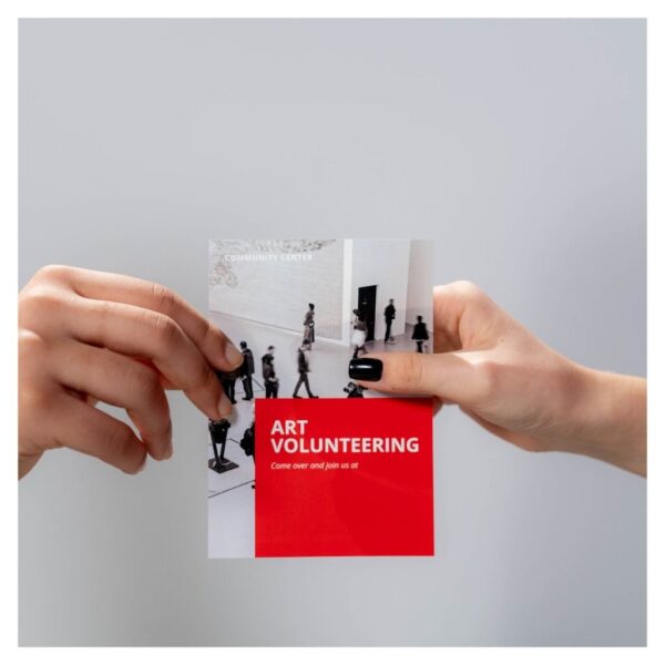 handing out brochure