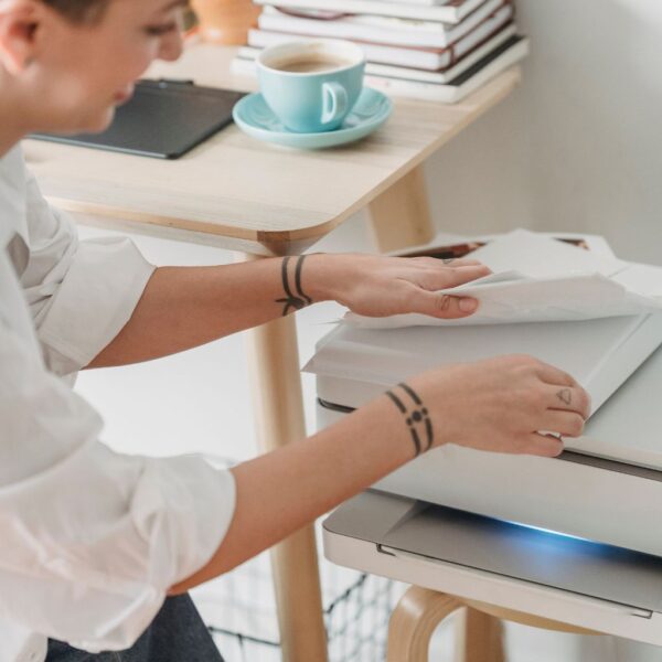 woman picking out paper